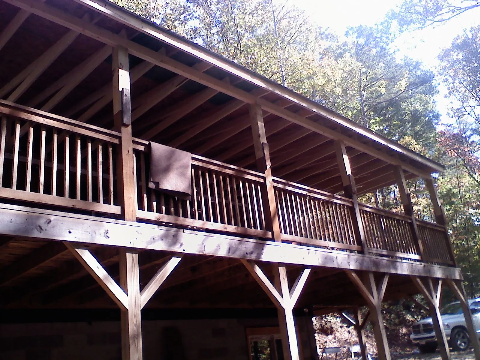 Timber framing under a new elevated porch and deck — Roof Leak Repair in Caldwell by Roofing Brothers